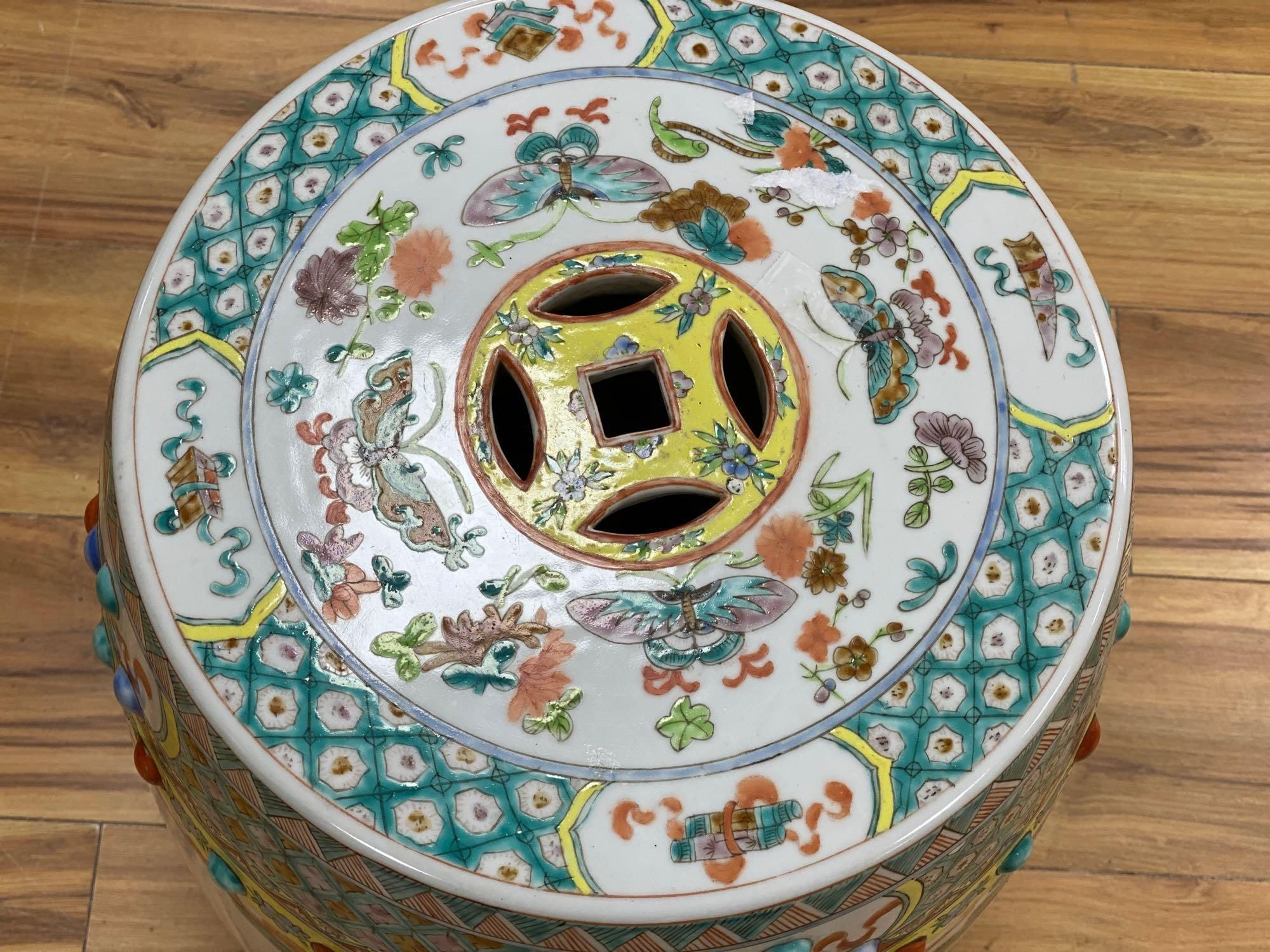 A Canton polychrome-decorated ceramic garden seat, 48cm high